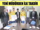 Yeni M�d�rden ilk takdir