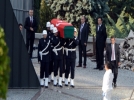 �zal�n naa�� yeniden defnediliyor