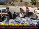 Da��t�lan k�m�r torbalar�na uyar� yaz�ld�