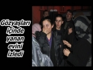 G�zya�lar� i�inde yanan evini izledi