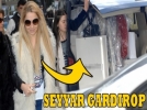 Gard�robunu bagajda ta��yor