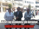 ��yerinin tabelas� zoraki s�k�lmek istenen kad�n esnaftan sert tepki: