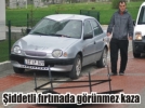 Baca r�zgarl��� otomobilin �zerine d��t�
