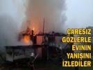 Evleri g�zlerinin �n�nde yand�