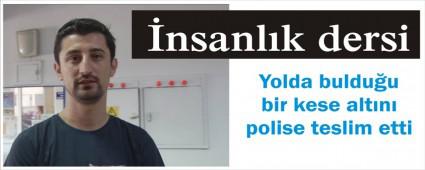 Buldu�u bir kese alt�n� polise teslim etti