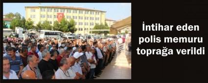�ntihar eden polis topra�a verildi