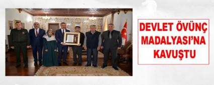   DEVLET �V�N� MADALYASI\'NA KAVU�TU