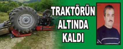 TRAKT�R�N ALTINDA KALDI   