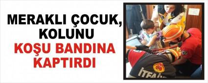MERAKLI �OCUK, KOLUNU KO�U BANDINA KAPTIRDI