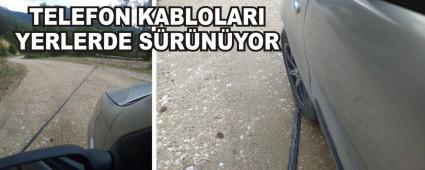 TELEFON KABLOLARI YERLERDE S�R�N�YOR