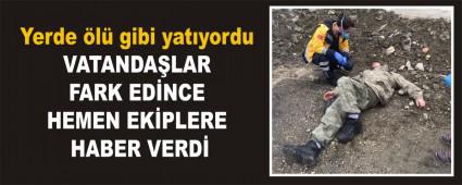 Yerde �l� gibi yat�yordu