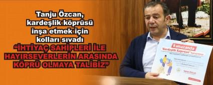 Tanju �zcan, karde�lik k�pr�s� in�a etmek i�in kollar� s�vad�