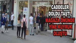 Caddeler doldu ta�t�, ma�aza �n�nde yine kuyruk olu�tu