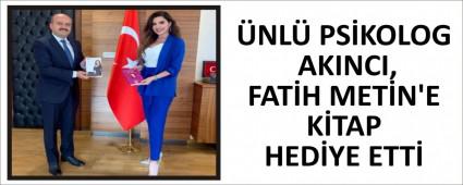 �NL� PS�KOLOG AKINCI, FAT�H MET�N\'E K�TAP HED�YE ETT�