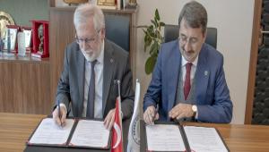 BA�B� VE �H� ARASINDA AKADEM�K �� B�RL��� PROTOKOL� �MZALANDI