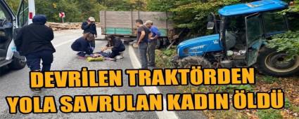 DEVR�LEN TRAKT�RDEN YOLA SAVRULAN KADIN �LD�