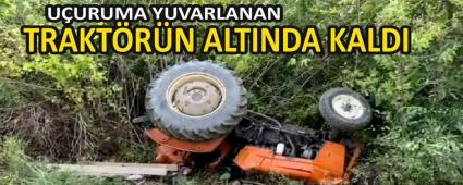 U�URUMA YUVARLANAN TRAKT�R�N ALTINDA KALDI