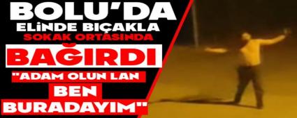 Elinde b��akla sokak ortas�nda ba��rd�